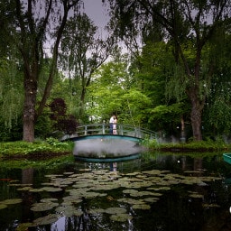 Bridge over a pond of water lilies by Monet. NJ Engagements & Weddings